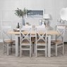 Derwent Grey 1.2m Table and 6 Wooden Cross Back Chairs lifestyle image of table and chairs