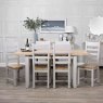 Derwent Grey 1.2m Table and 6 Wooden Ladder Back Chairs lifestyle image of the table and chairs
