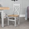 Derwent Grey 1.8m Table and 4 Wooden Cross Back Chairs lifestyle image of a chair