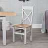 Derwent Grey Wooden Cross Back Chair lifestyle image of the chair