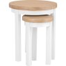 Derwent White Round Nest of 2 Tables nesting tables on a white background