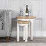 Derwent White Round Nest of 2 Tables lifestyle image of the nesting tables
