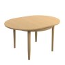 Warwick Oak Round Crown Dining Table on Legs side angle and top view of the table on a white background