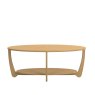 Warwick Oak Sunburst Oval Coffee Table side angle of the coffee table on a white background