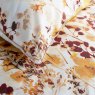 The Lyndon Company Watercolour Spice Meadow Duvet Cover Set close up image of the bedding