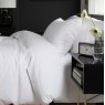 The Lyndon Company White Morocco Duvet Cover Set side on lifestyle image of the bedding