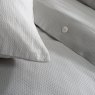 The Lyndon Company Silver Morocco Duvet Cover Set close up image of the bedding and pillow