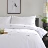 The Lyndon Company Feathers Duvet Cover Set close up front on lifestyle image of the bedding