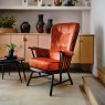 Ercol Evergreen High Back Easy Chair in red lifestyle shot - Aldiss of Norfolk