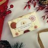 The English Soap Company Frankincense and Myrrh Soap lifestyle image of the wrapped soap bar