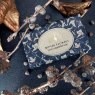 The English Soap Company Winter Flowers Christmas Soap lifestyle image of the wrapped soap bar