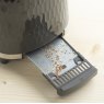 Daewoo Honeycomb 2 Slice Grey Toaster close up lifestyle image of the crumb tray