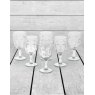 Set Of 6 Clear Deco Face Wine Glasses lifestyle image of the set
