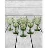 Set Of 6 Green Deco Face Wine Glasses lifestyle image of the set