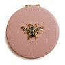 Alice Wheeler Pink Round Compact Mirror image of the mirror on a white background