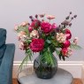 Floralsilk Dark Pink Peony Bud lifestyle image of the peony bud in a bunch in a vase