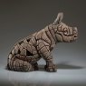 Edge White Rhinoceros Calf Sculpture side on angled image of the sculpture on a dark grey background