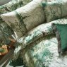 Graham & Brown Coppice Forest Sage Duvet Cover Set close up lifestyle image of the duvet set