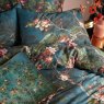 Graham & Brown Night Garden Navy Feather Cushion close up lifestyle image of the cushion with the duvet set