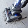 Tower Blue Bagless Pet Upright Vacuum Cleaner lifestyle image of the vacuum cleaner