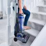 Tower Blue Bagless Pet Upright Vacuum Cleaner lifestyle image of the vacuum cleaner
