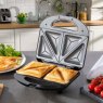 Daewoo 2 Portion Sandwich Toastie Maker lifestyle image of the toastie maker in use