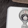 Salter White Magnifying Mechanical Bathroom Scale close up lifestyle image of the scales