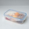 Addis Clip Tight 900ml Rectangular Container lifestyle image of the container with lid on on a white background