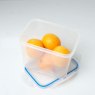 Addis Clip Tight 1.1L Rectangular Container lifestyle image of the container on a white surface