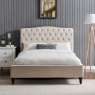 Beatrice Bedstead In Natural front on lifestyle image of the bedstead