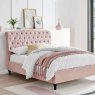 Beatrice Bedstead In Pink angled lifestyle image of the bedstead