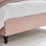 Beatrice Bedstead In Pink close up lifestyle image of the front feet of the bedstead