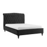 Beatrice Bedstead In Black Velvet angled image of the bedstead with a mattress on a white background