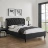 Beatrice Bedstead In Black Velvet angled lifestyle image of the bedstead
