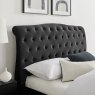Beatrice Bedstead In Black Velvet close up lifestyle image of the headboard of the bedstead