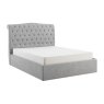 Beatrice Ottoman In Light Grey angled image of the ottoman bed with a mattress on a white background