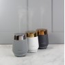 Stoneglow Luna White And Silver Perfume Mist Diffuser lifestyle image of the diffuser and other colour options