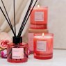 Stoneglow Light Blush Rose & Peony Soy Wax Scented Candle lifestyle image of the candle
