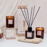Stoneglow Wood Elements Palo Santo & Amber Soy Wax Scented Candle lifestyle image of the candle