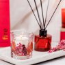 Stoneglow Fire Elements Red Pepper & Cardamom Botanical Wax Tumbler lifestyle image of the candle
