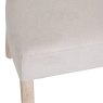 Holkham Oak Natural Fabric Dining Chair close up image of the material of the chair on a white background