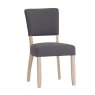 Holkham Oak Grey Fabric Dining Chair angled image of the dining chair on a white background