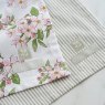 Sophie Allport Blossom Tea Towel Pair close up lifestyle image of the tea towel pair