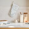 Sophie Allport Spring Chicken Oven Mitt lifestyle image of the oven mitt