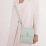 Alice Wheeler Pastel Mint Bloomsbury Cross Body Bag lifestyle image of the bag