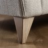 Neptune Chair lifestyle image of the weathered ash foot option