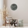 Thomas Kent Mulberry 20" Olive Green Wall Clock lifestyle image of the clock