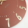 Thomas Kent Arabic 12" Auburn Wall Clock close up image of the clock on a white background