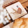 The Humble Hare Pheasant Parade Coaster Pair lifestyle image of the coaster