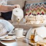 The Humble Hare Humming Hives Coaster Pair lifestyle image of the coaster